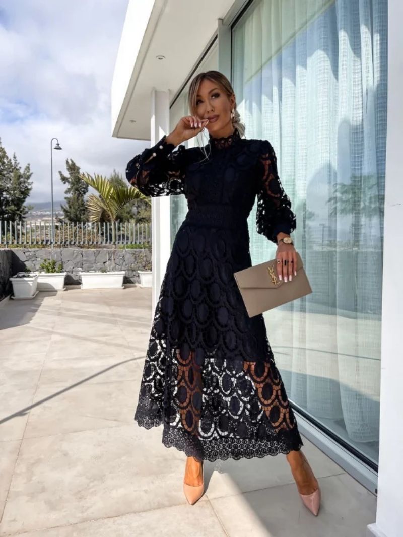 Flowing long sleeve women's dress, elegant and chic for parties, special occasions, and formal evenings.