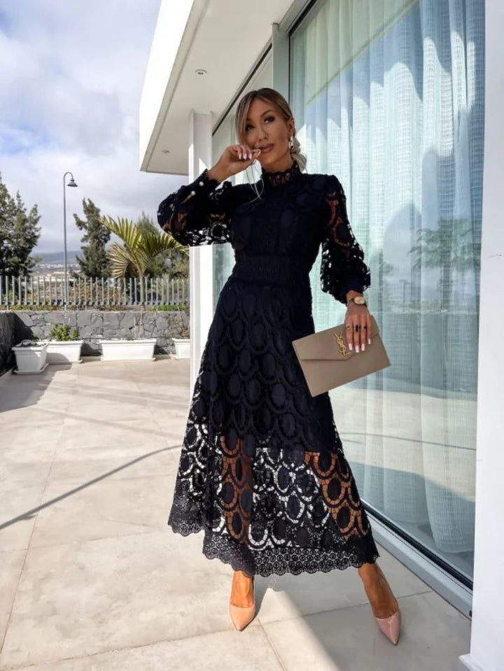 Flowing long sleeve women's dress, elegant and chic for parties, special occasions, and formal evenings.