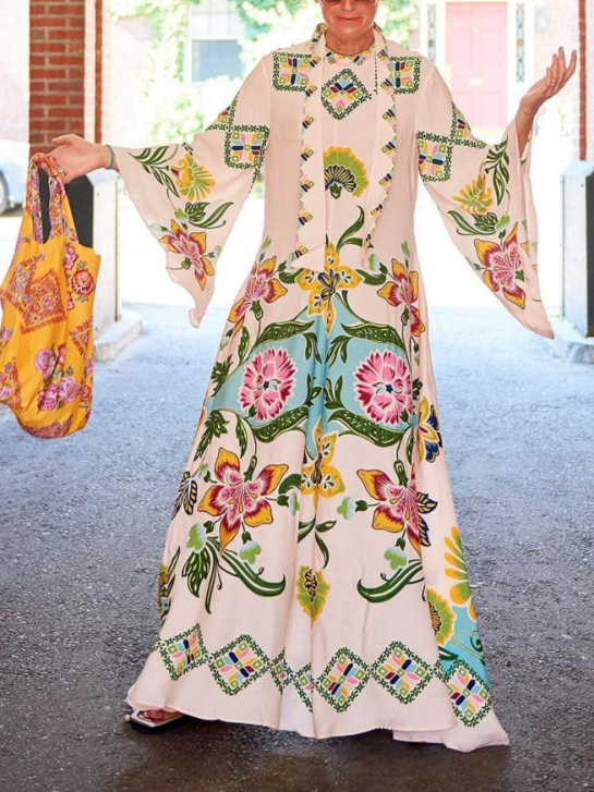 Stylish cream floral maxi dress for women, a flowy long sleeve design ideal for elegant summer and occasion wear.