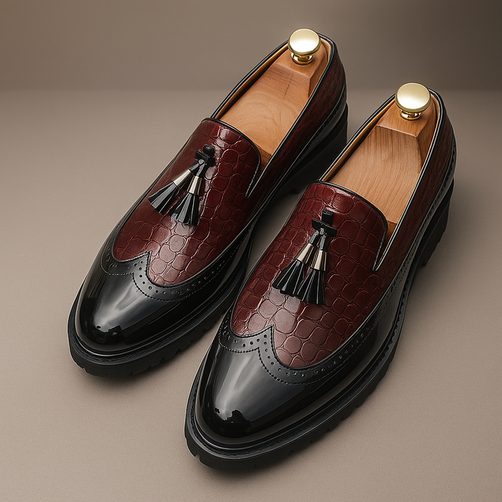 Pair of elegant men's croc-embossed tassel loafers, perfect classic luxury dress shoes for formal events.