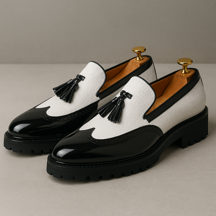 Classic men's formal tassel loafers with a distinctive croc-embossed texture, ideal for dressy occasions.