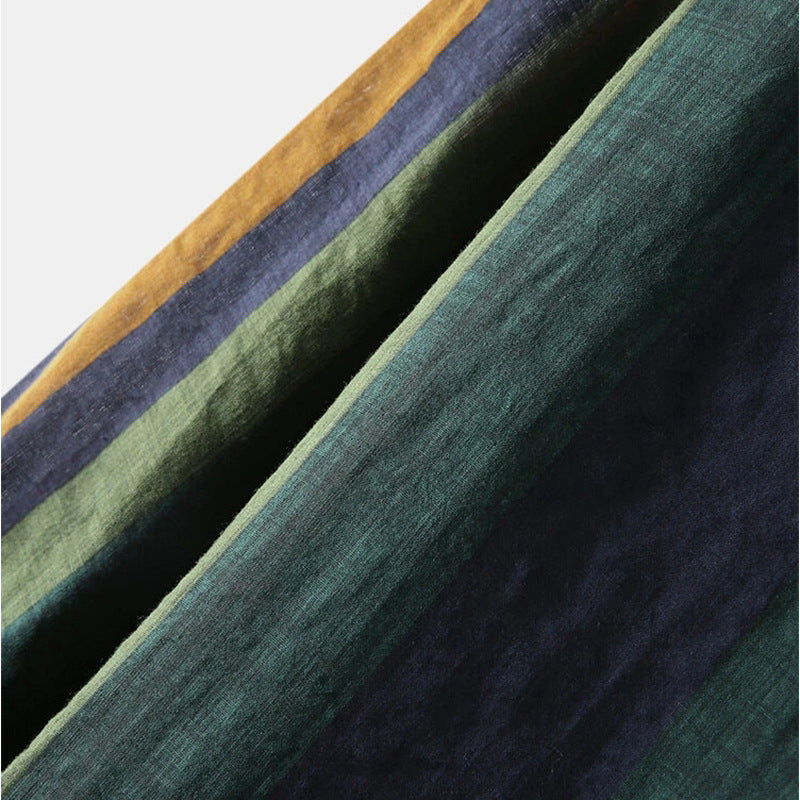 Full view of men's modern fit green striped long-sleeve shirt. Versatile for everyday casual style.