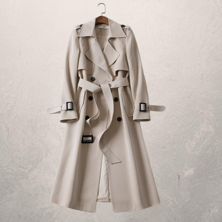 Women's classic double-breasted trench coat with belt. Timeless long outerwear for elegant style.