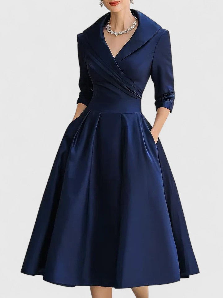 Elegant women's pleated flared midi dress with a stylish wrap bodice, perfect for parties & formal occasions.