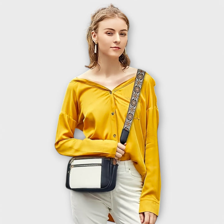 Women's fashion retro handbag, durable vegan leather, with a vibrant boho adjustable shoulder strap.