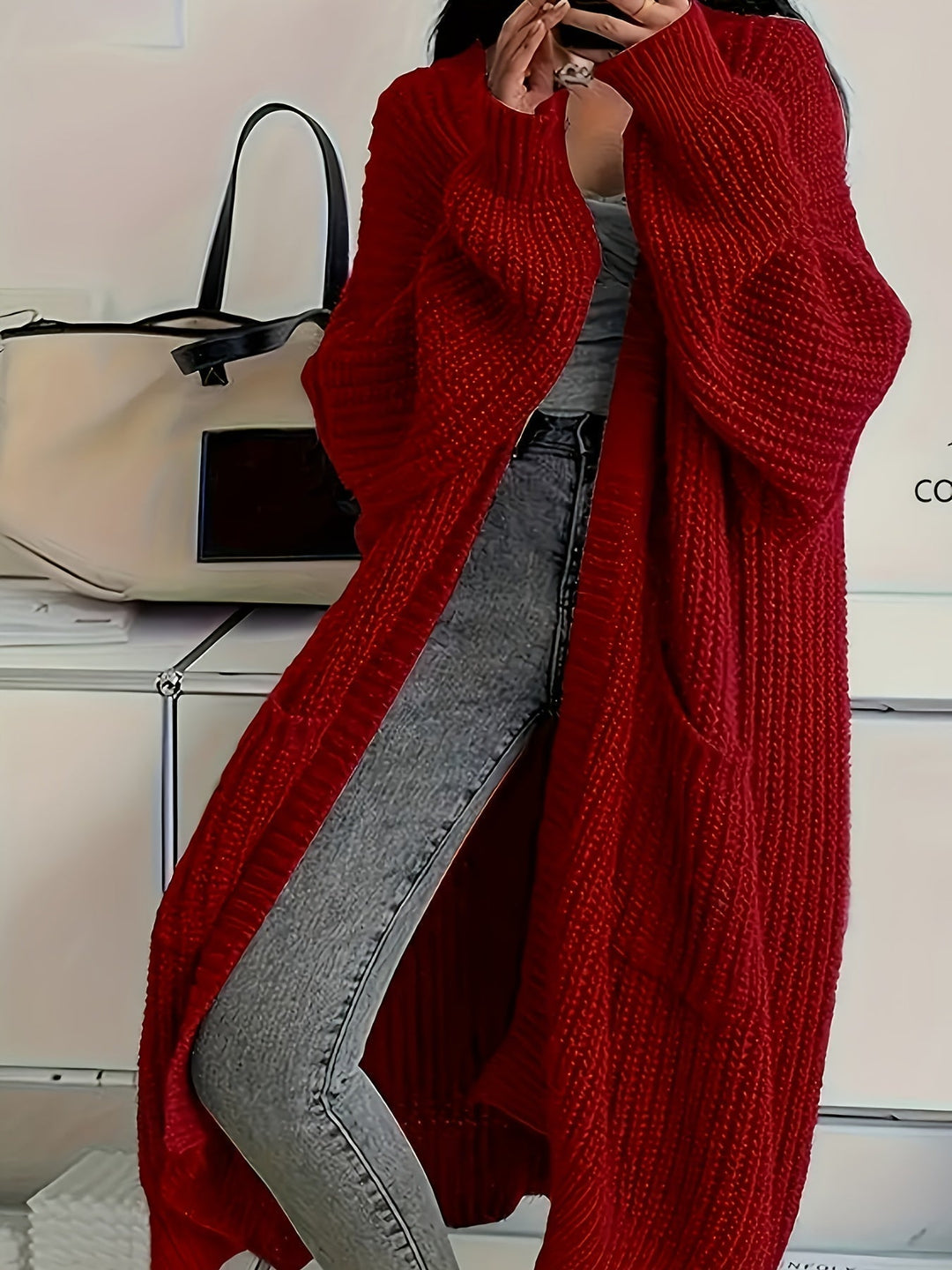 Super cosy women's V-neck cardigan sweater, ideal for winter comfort & warmth.