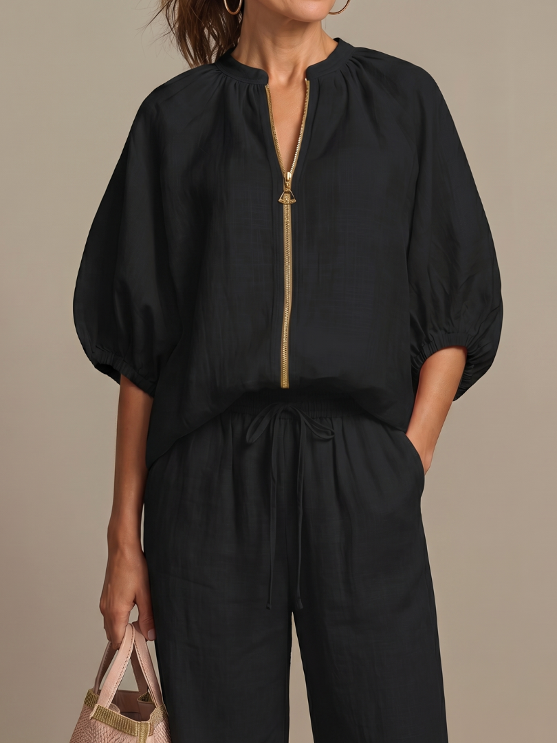 Women's versatile two-piece: zip front blouson top & wide leg pants, perfect for a casual chic look.