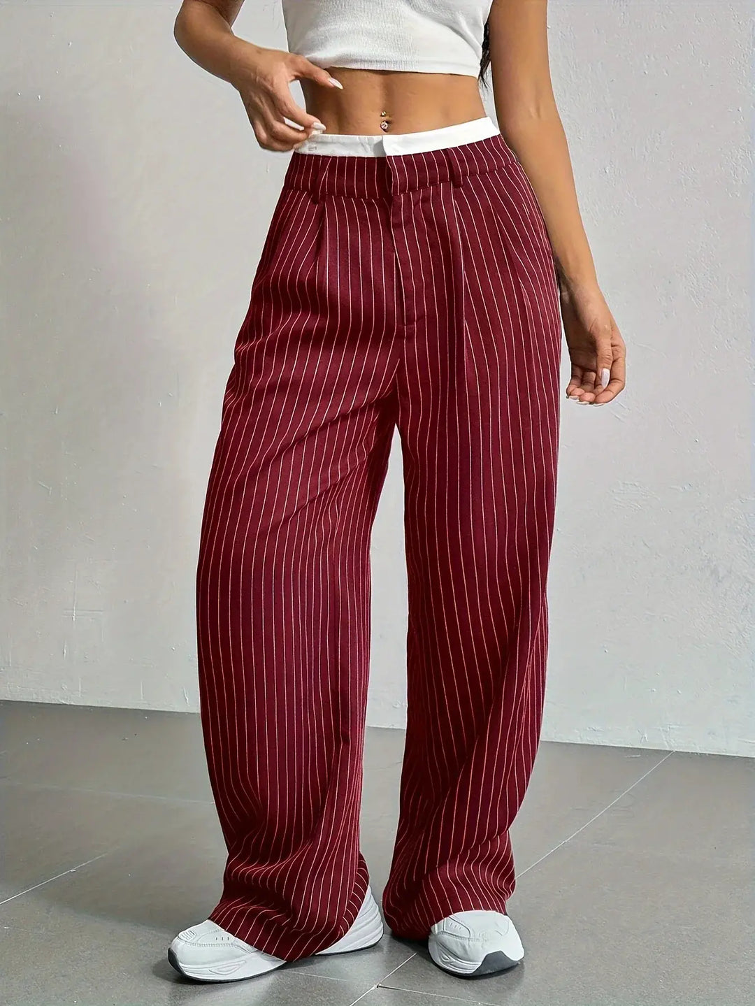 Versatile striped wide leg trousers, ideal for smart casual occasions.