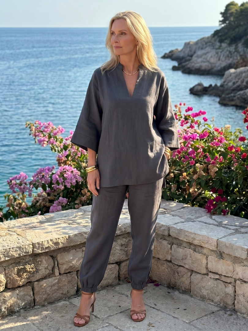 Relaxed women's two-piece set: V-neck tunic & gathered trousers, perfect for casual elegance.