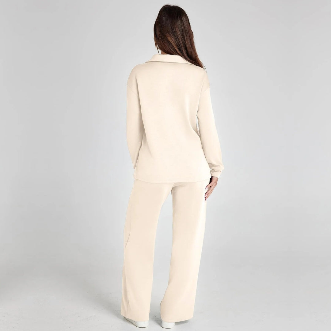 Soft women's V-neck long sleeve top and matching wide leg trousers. Comfortable two-piece set.