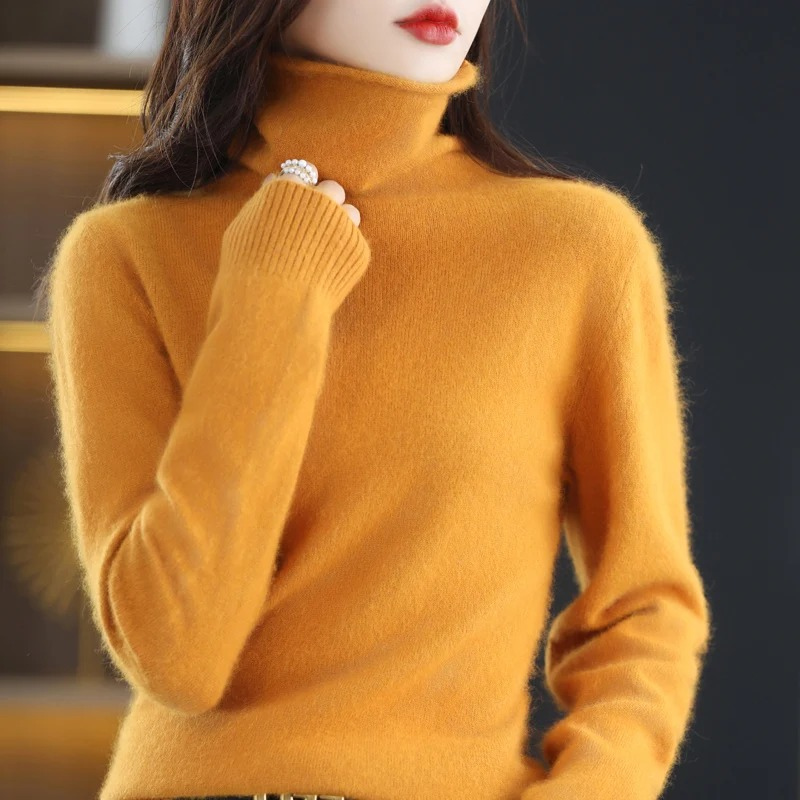 Comfortable women's turtleneck sweater, warm long sleeve knit for versatile chic styling.