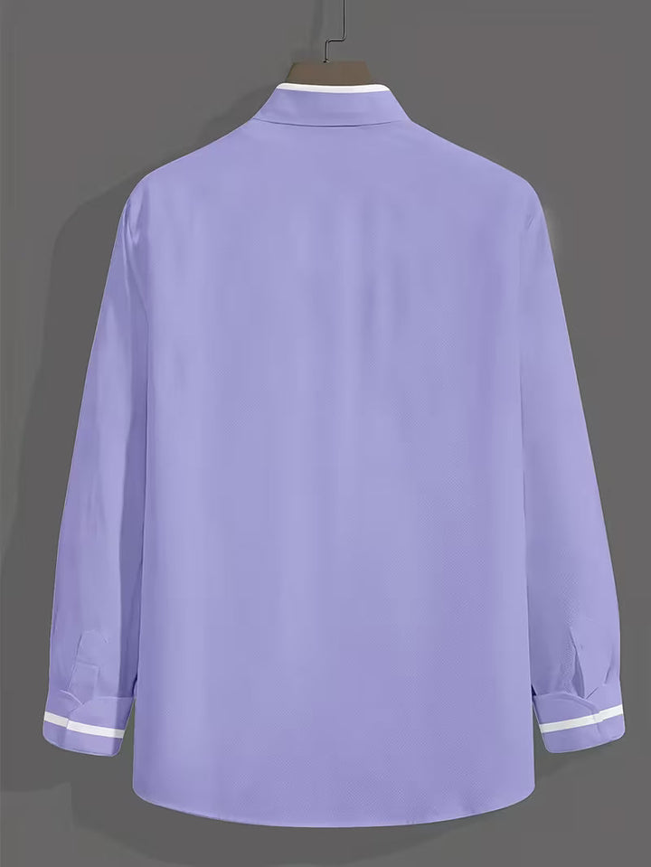 Stylish slim fit men's shirt with Grandad collar & long sleeves. Features a chic contrast trim chest pocket.