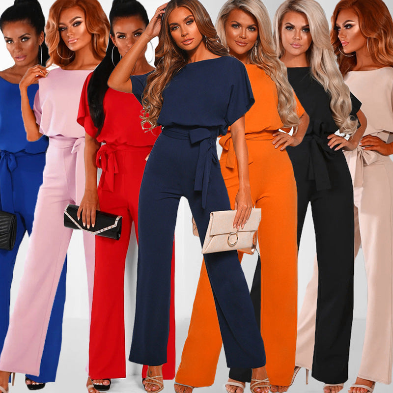 Elegant women's wide-leg jumpsuit with chic tied waist. Versatile fashion for party or casual wear.