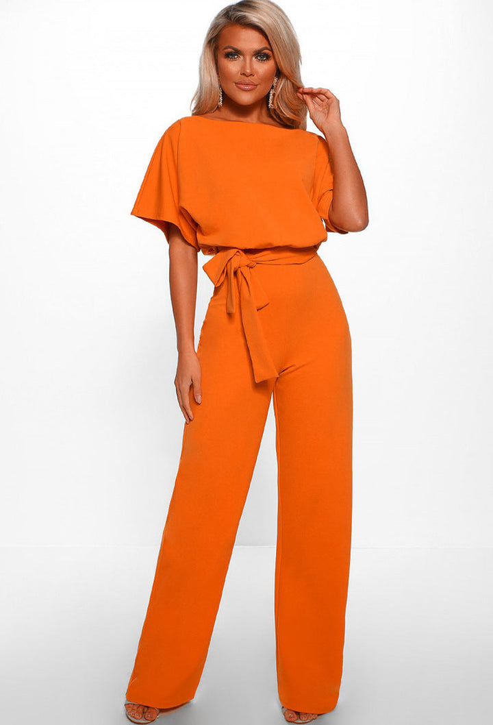 One-piece elegant women's wide-leg jumpsuit, designed with a comfortable fit and a stylish tied waist.