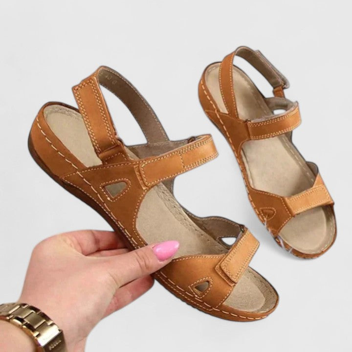 Women's pain relief sandals, ultimate comfort with ergonomic arch support & cushioned design.