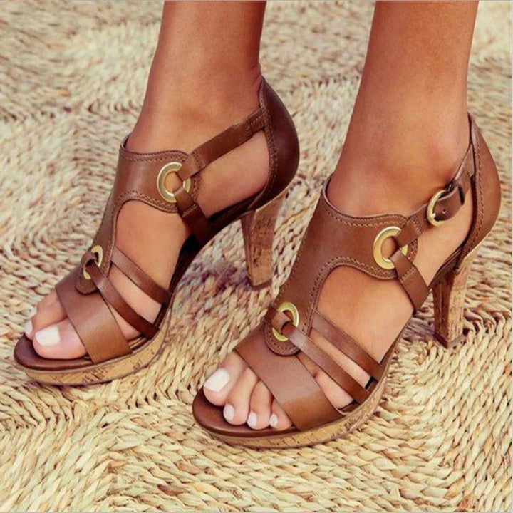 Stylish women's high heel sandals with elegant straps, perfect for a confident fashion statement.
