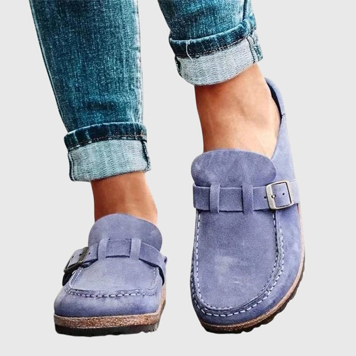 Women's orthopaedic clogs providing foot pain relief, arch support, & ergonomic comfort for daily wear.
