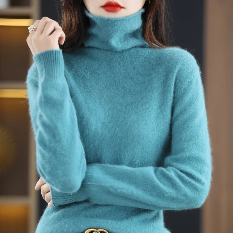 Warm women's long sleeve turtleneck sweater, comfortable and versatile for everyday style.