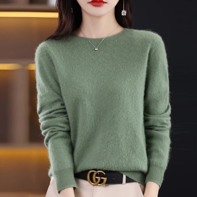 Chic women's luxury sweater with a round neck, featuring soft knit for ultimate comfort & warmth.