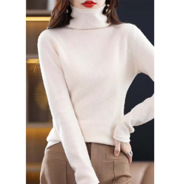 Everyday chic women's roll neck. Soft, comfortable long sleeve pullover top.