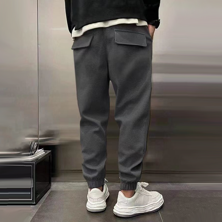 Men's smart casual relaxed fit pants, combining comfort with a stylish, modern aesthetic.