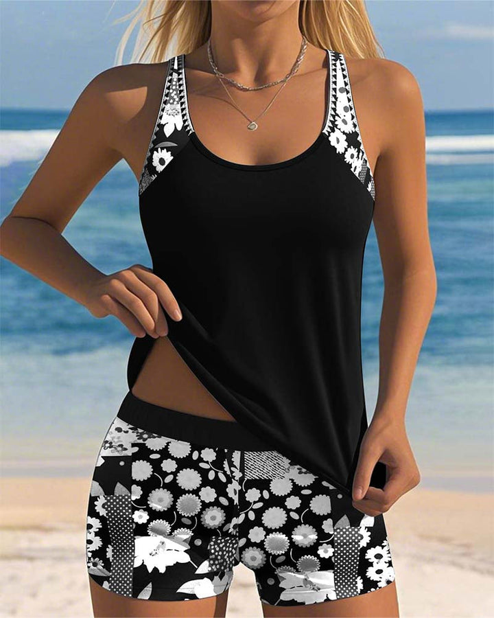 Fashionable women's printed swimwear set. Ideal for vacation, beach, or pool. Tankini & shorts.
