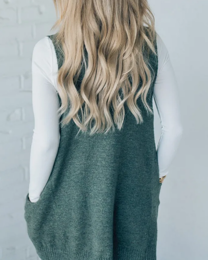 Versatile women's A-line layering vest, perfect for chic fall fashion or cozy winter outfits.