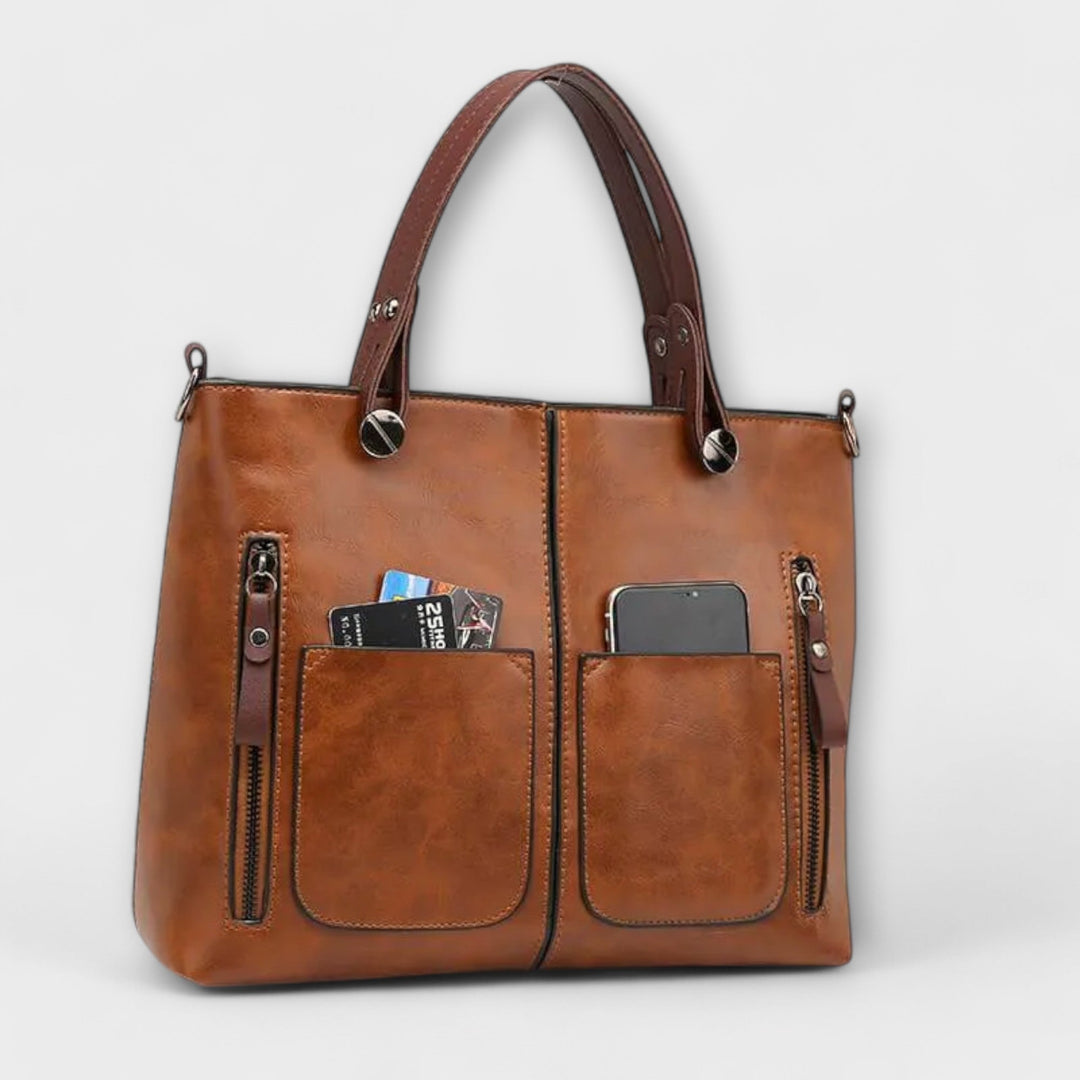 Classic women's leather work bag. Stylish shoulder bag and handbag, perfect for daily office use.