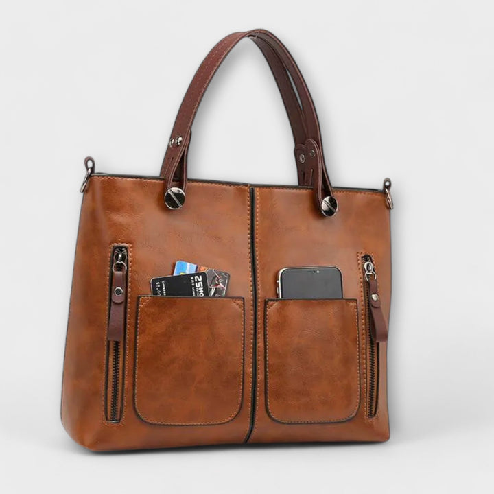 Classic women's leather work bag. Stylish shoulder bag and handbag, perfect for daily office use.
