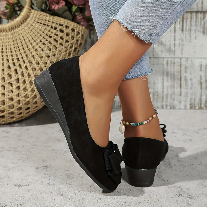Women's supportive flats for foot pain relief, orthopedic design, casual elegance.