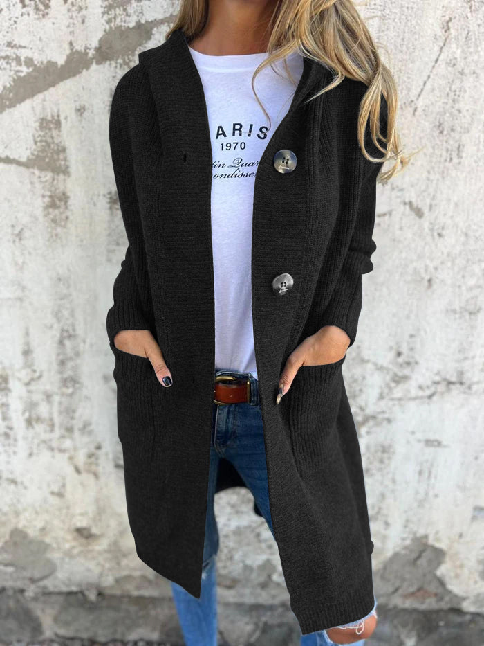 Soft knit women's longline hooded cardigan, a cozy and elegant outerwear piece for cold weather.