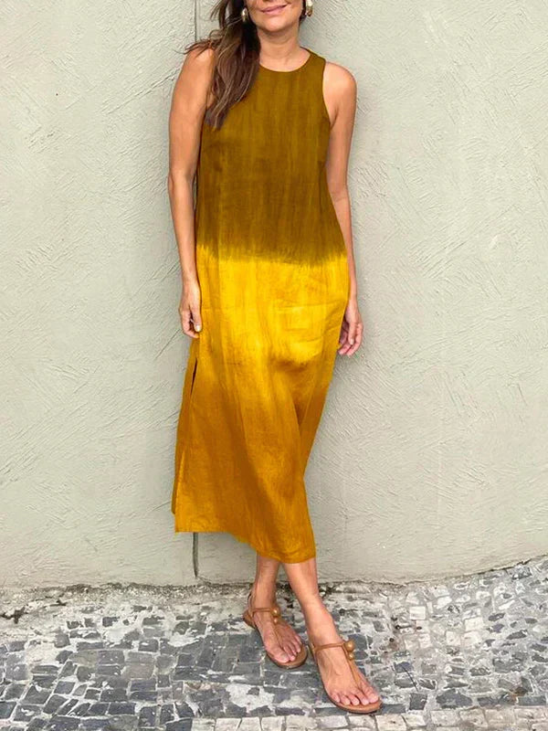Woman wearing a chic print maxi dress, showcasing its comfortable and effortless style for summer fashion.