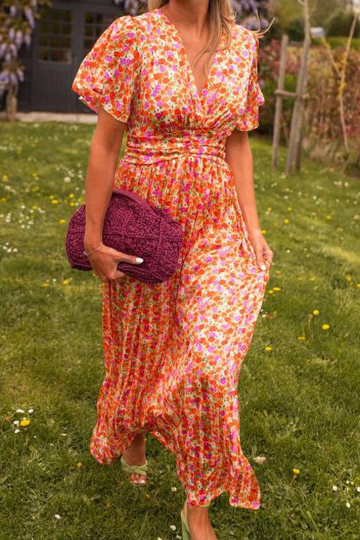 Stylish V-neck floral print maxi dress for women, offering a comfortable and chic summer look.