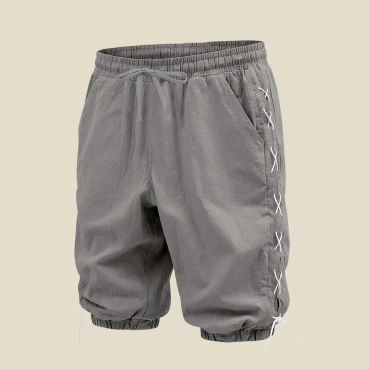 Relaxed fit men's shorts with lace-up sides and drawstring waist, suitable for everyday casual and summer.