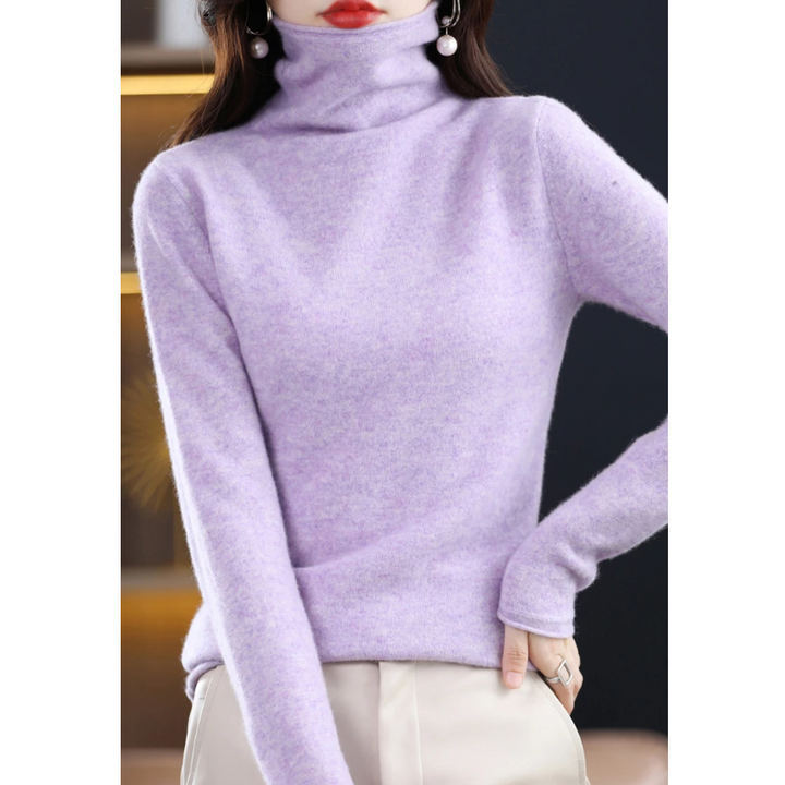 Women's elegant roll neck sweater. Soft, warm long sleeve pullover for versatile styling.