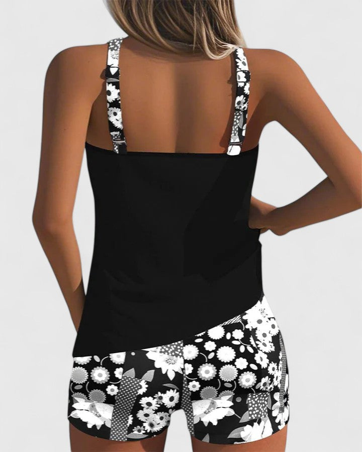 Comfortable women's floral tankini. Vibrant summer swimwear, perfect for vacation or resort.