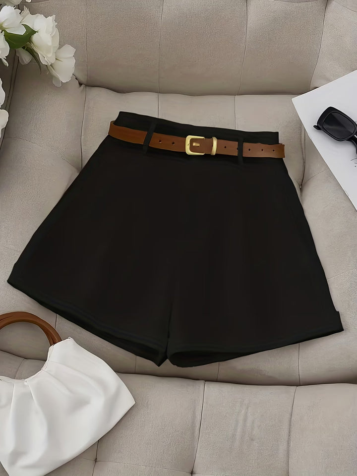 Classic women's belted shorts, versatile for everyday wear. Tailored design for a stylish summer look.