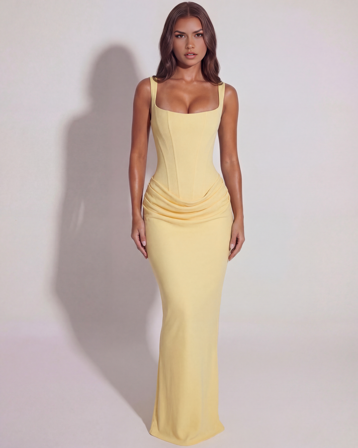 Women's formal yellow maxi dress featuring a chic sculpted bodice, perfect for evening events.
