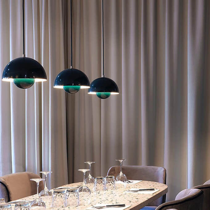 Minimalist Scandinavian dome pendant light, an elegant addition to any living room.