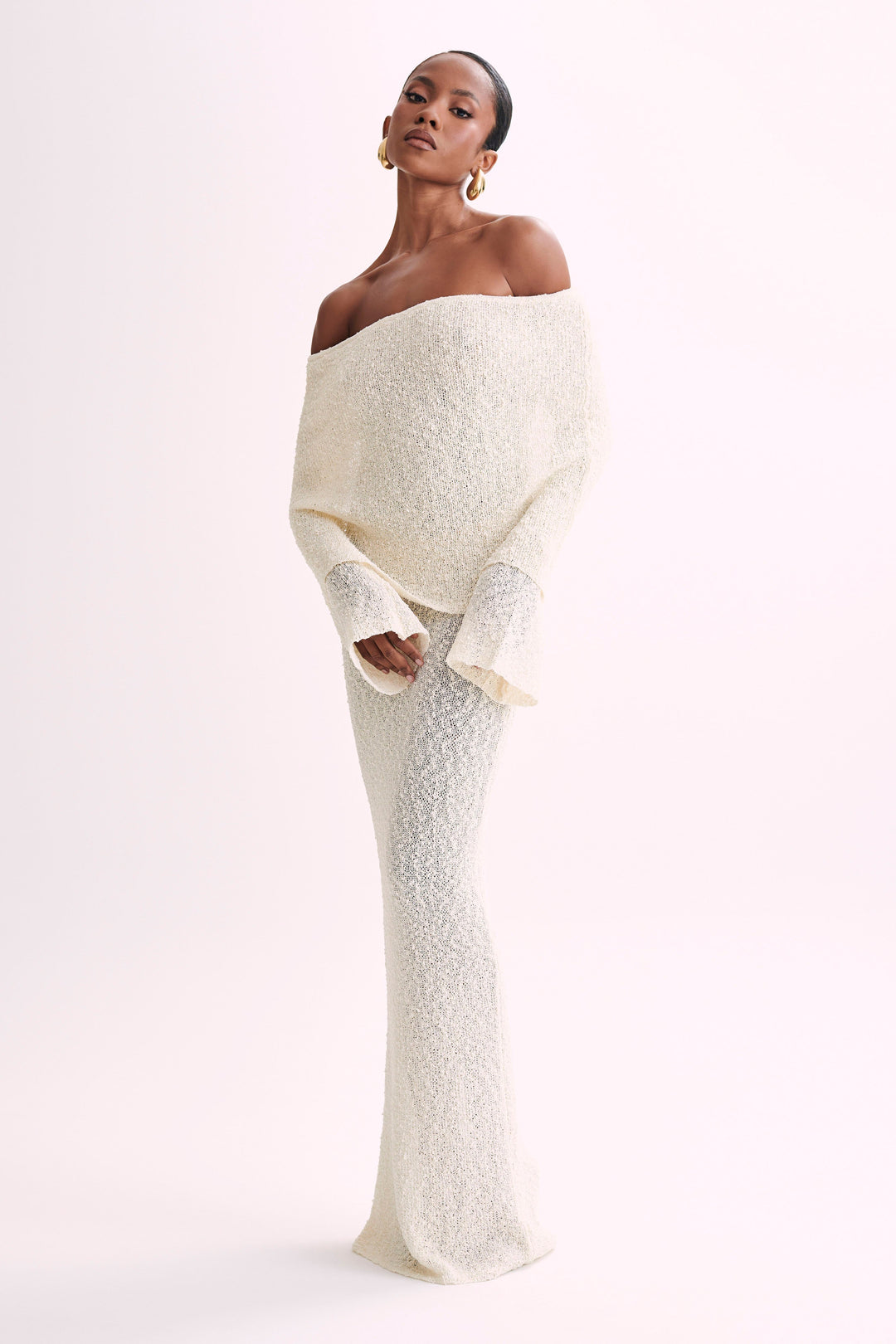 Elegant women's off-shoulder maxi dress, perfect for evening parties & formal occasions.