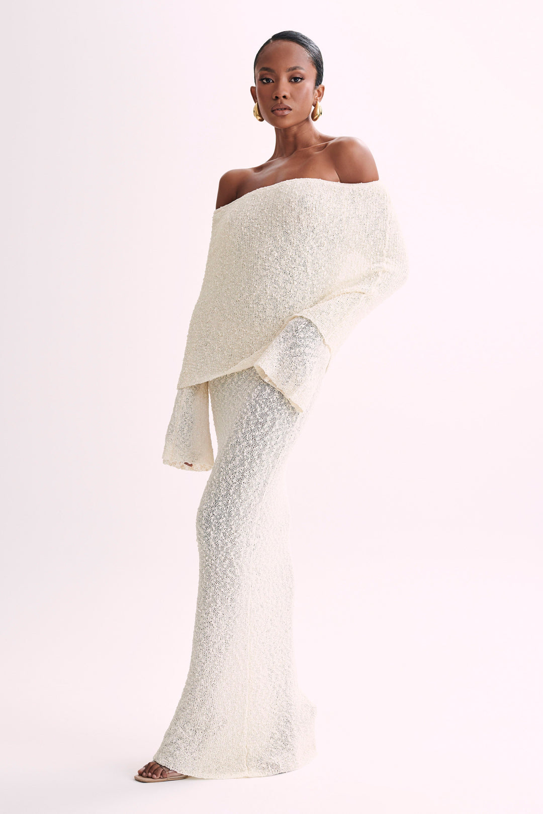 Beautiful off-shoulder maxi dress, an elegant choice for women's formal party wear this season.