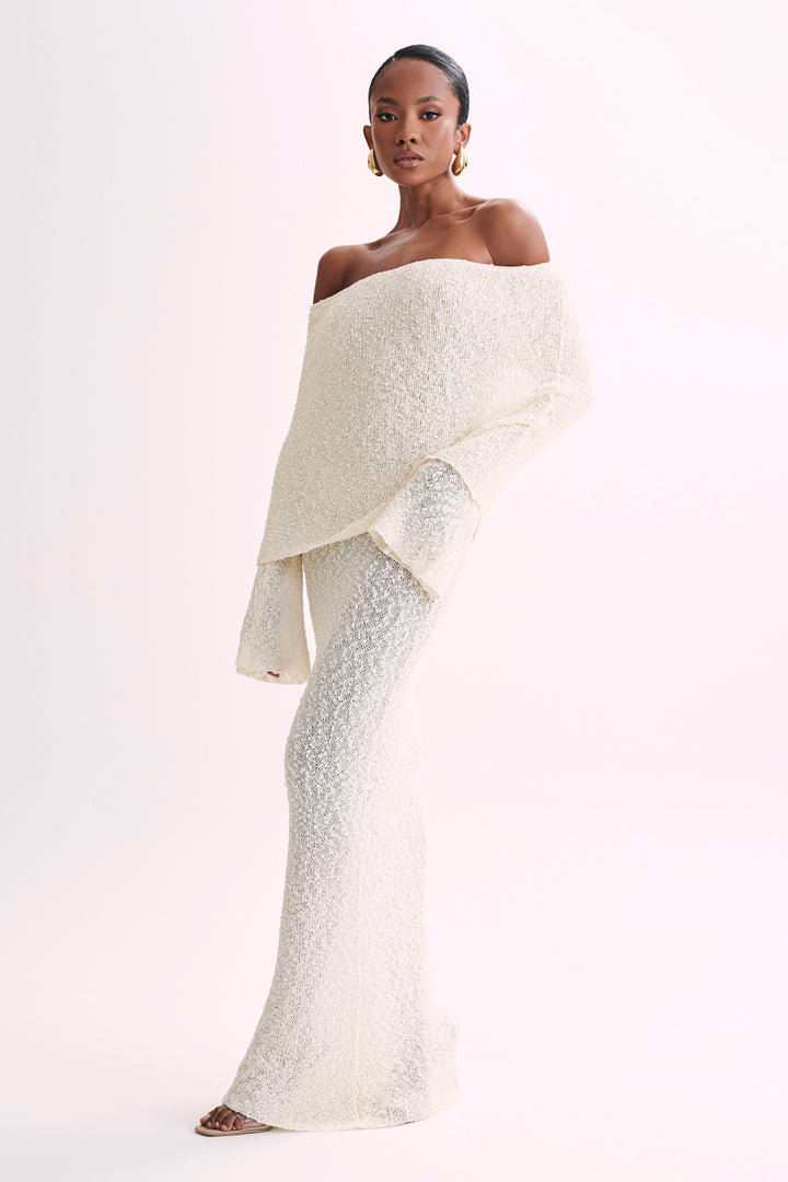 Beautiful off-shoulder maxi dress, an elegant choice for women's formal party wear this season.