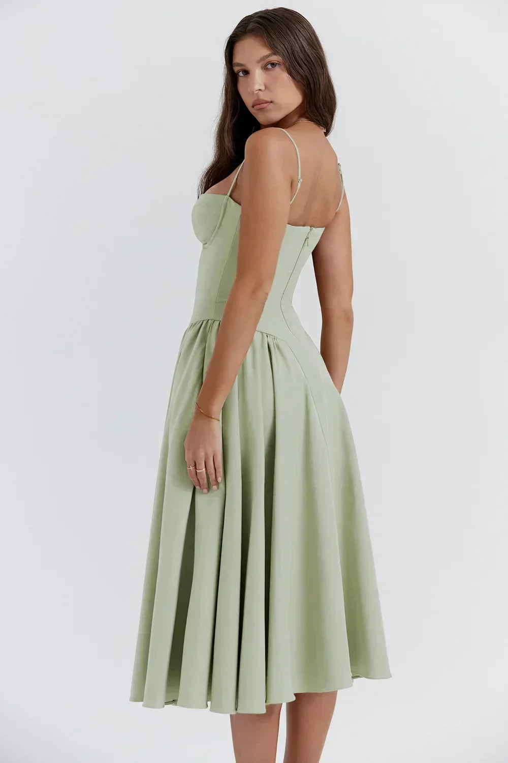 Women's elegant evening dress, sleeveless with a chic corset and midi cut. Gala & formal event ready.