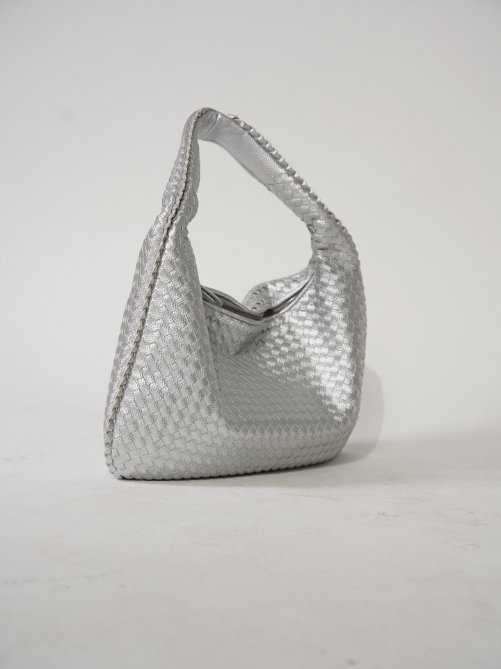 Stylish vegan leather crossbody handbag for women. Versatile & elegant shoulder bag design.