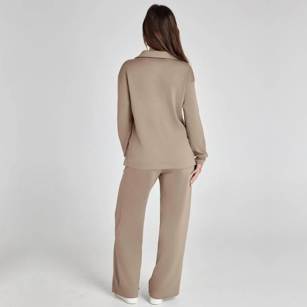 Stylish women's long sleeve V-neck loungewear set. Features wide leg trousers & drawstring waist.