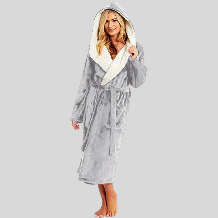 Soft polyester women's hooded bathrobe for ultimate comfort & relaxation. Great for spa, loungewear or gift.
