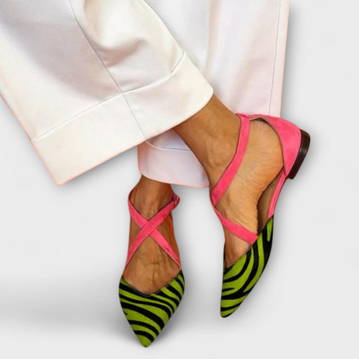 Versatile women's flat loafers. Elegant band detail, comfortable slip-on design for chic everyday fashion.