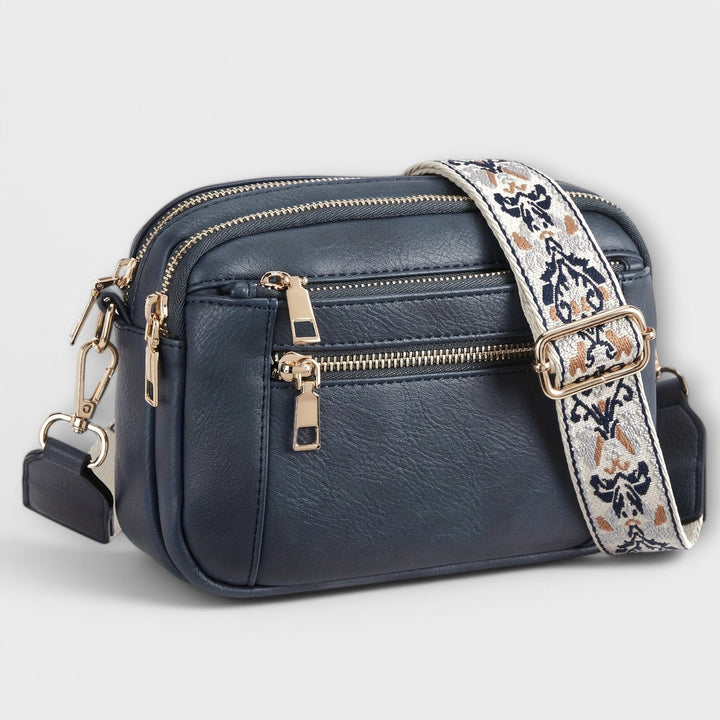 Boho retro women's crossbody bag, vegan leather, with an eye-catching adjustable shoulder strap.