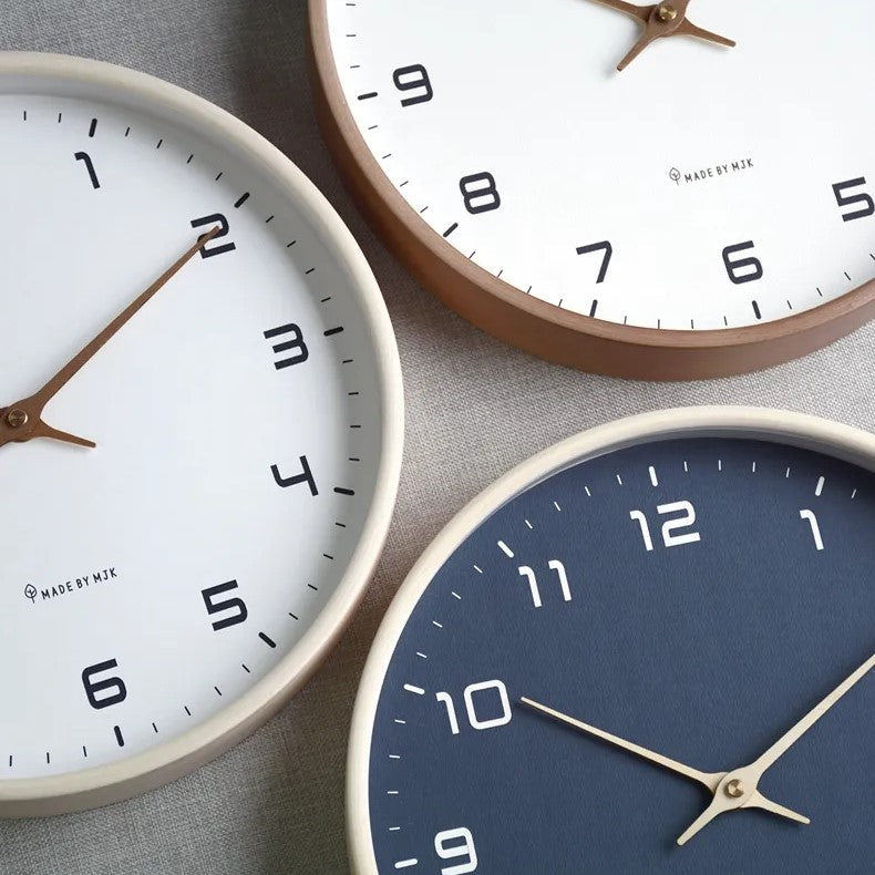 Functional art: minimalist silent wall clock. Natural wood frame, clear design for contemporary home decor.