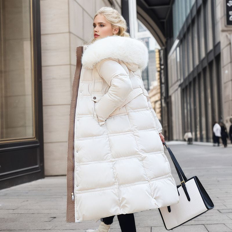 Elegant women's winter coat, sophisticated design, warm, and includes a removable hood for style.